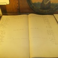 Stevens Point Brewery workers time log book from 1909.